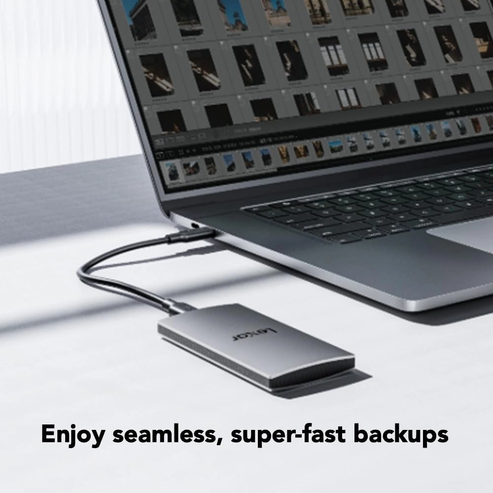 Lexar 2TB ES3 Portable SSD, Up to 1050MB/s Read and 1000 MB/s Write, Compatible with PC & Mac, Tablets & iPad, Silver (LES3XXX002T-RNSAU)